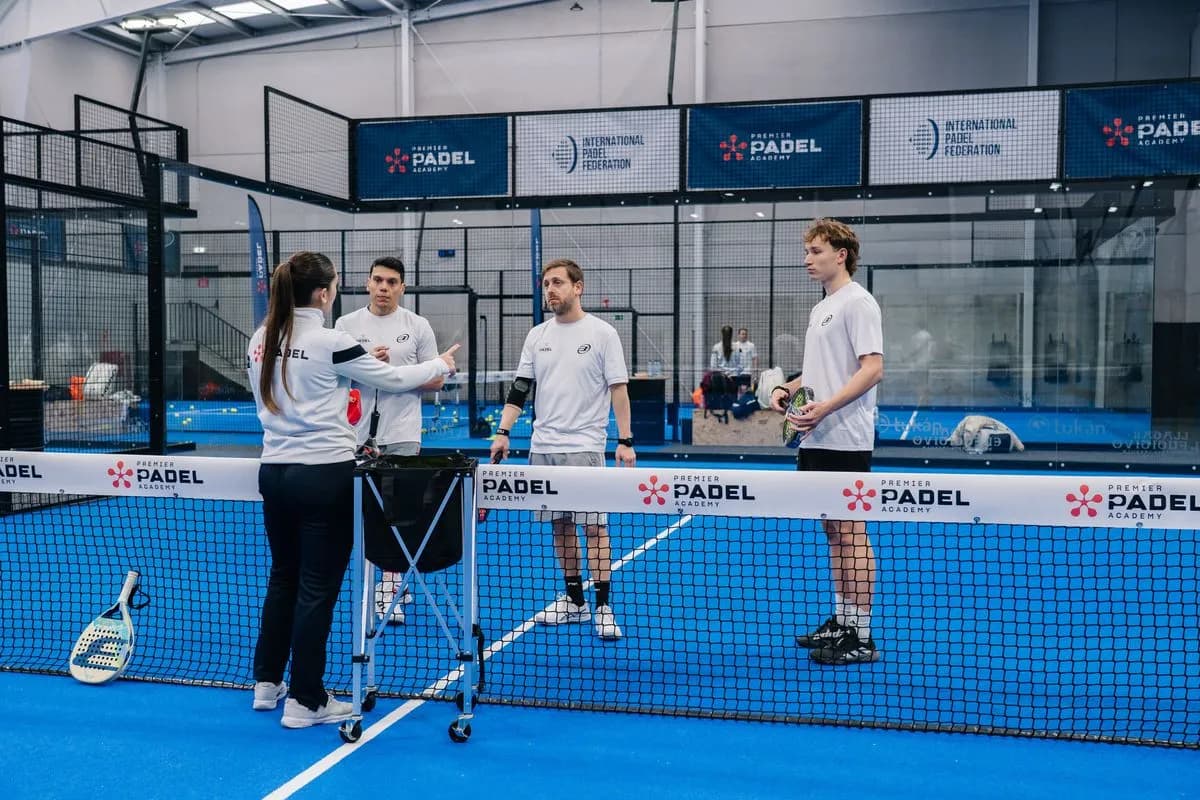 Adults training padel at Premier Padel Academy camp